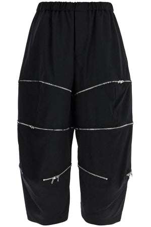 COMME DES GARÇONS SHIRT CROPPED PANTS WITH ZIP OPENINGS.