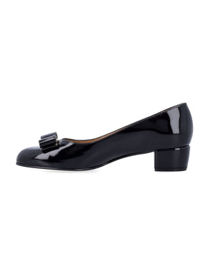 FERRAGAMO Classic Patent Leather Pumps with Iconic Bow Detail