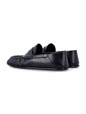 SAINT LAURENT Men's Penny Loafers with Flexible Design