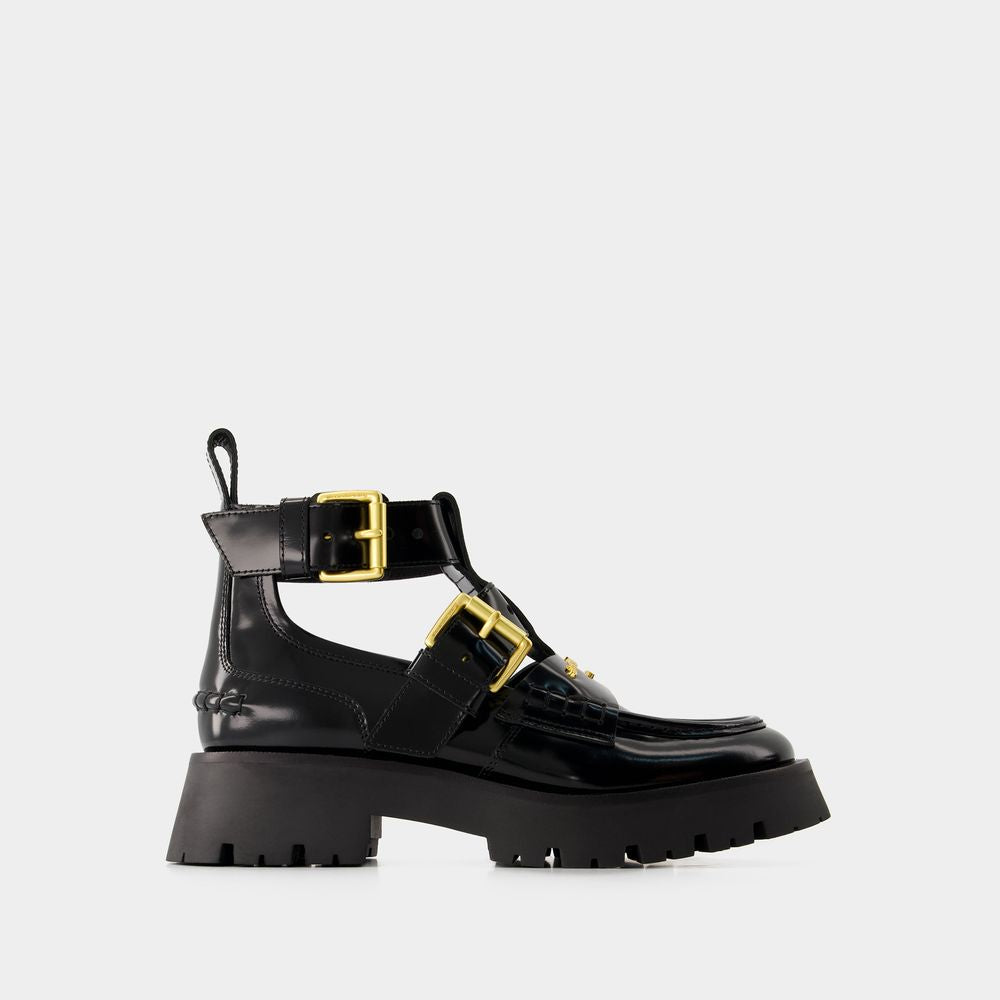 ALEXANDER WANG Black Carter Lug Ankle Boots for Women (SS24 Collection)