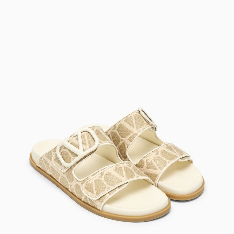 VALENTINO GARAVANI Signature V Logo Slide Sandals for Women in Nude & Neutrals