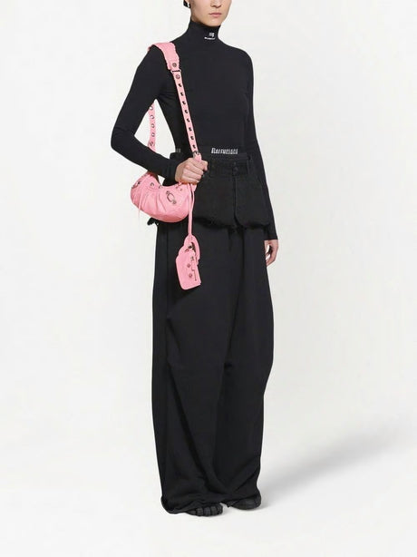 BALENCIAGA Elegant Pink Leather Crossbody Handbag with Metal Studs and Buckles