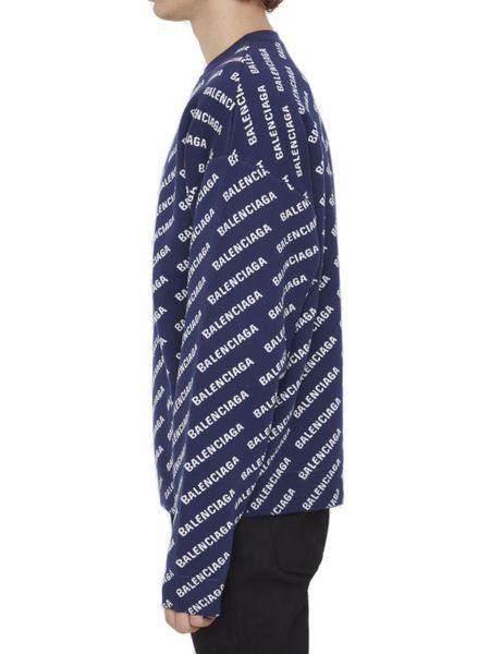 Áo len cổ tròn xanh lá cây cho nam của Balenciaga với họa tiết logo toàn phần