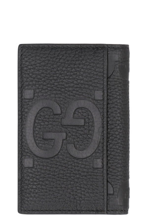 GUCCI Black Vertical Wallet in Jumbo GG Pattern