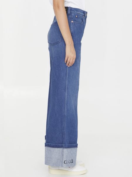 GUCCI Wide-Leg Denim Jeans with Leather Logo Tag and Roll-Up Ankle Cuffs for Women - FW23