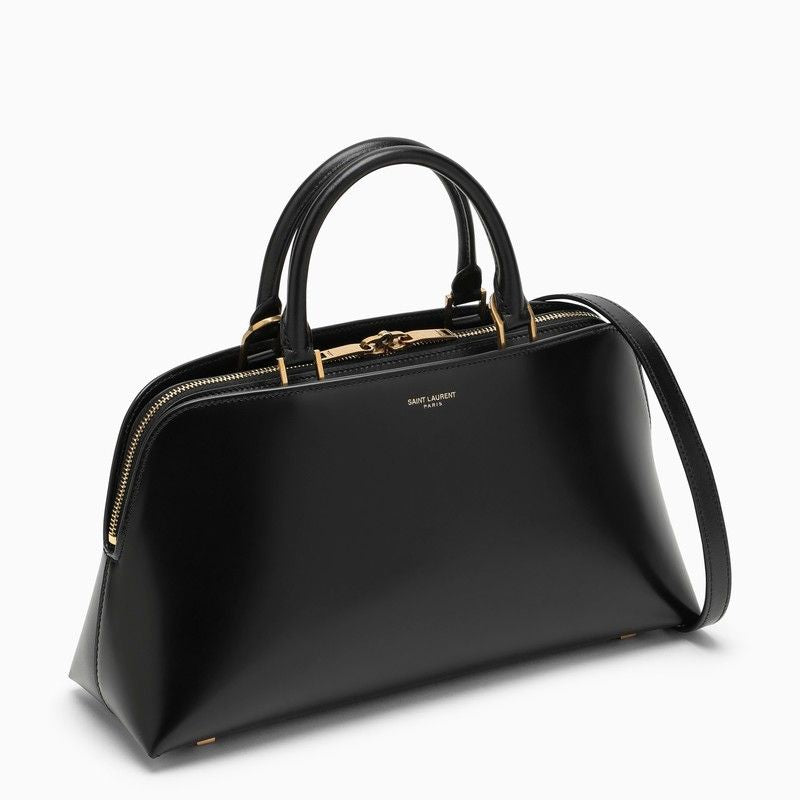 SAINT LAURENT Small Shiny Black Leather Duffle Handbag with Bronze Metal Accents and Adjustable Strap for Women