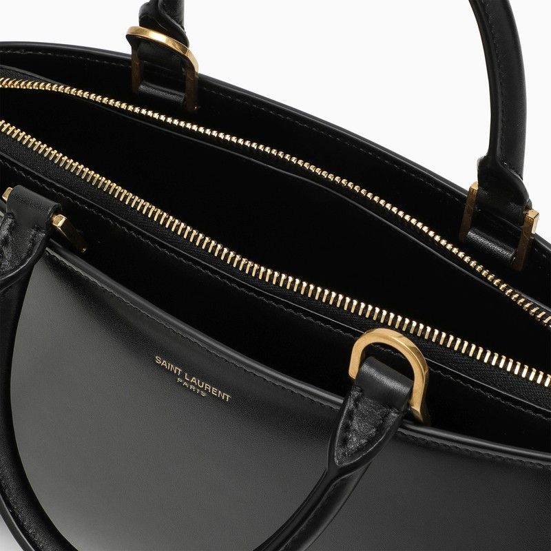 SAINT LAURENT Small Shiny Black Leather Duffle Handbag with Bronze Metal Accents and Adjustable Strap for Women