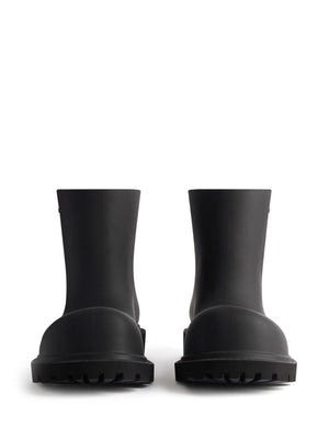 BALENCIAGA Trendy Black Boots for the Modern Man - Spring/Summer 2024 Collection