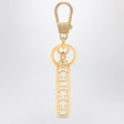 GUCCI Elegant Golden Key Ring with Logo