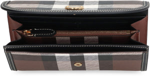 BURBERRY Check out this stylish continental wallet for women