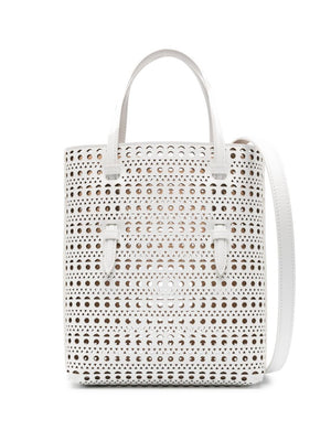 ALAIA White Leather Bucket Handbag with Signature Laser-Cut Motif for Women