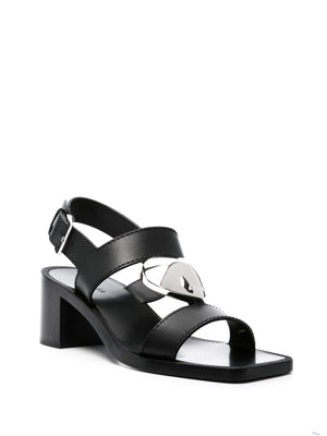 ALAIA Black Leather Sandals with Heart Charm and Block Heel - FW23 Collection