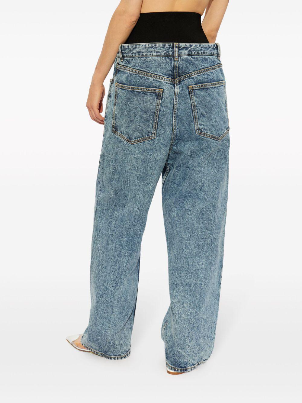 ALAIA Low-Rise Snow Denim Jeans with Knit Waistband