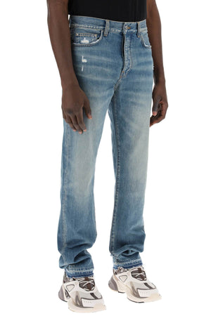 AMIRI Medium-Washed Distressed Jeans for Men