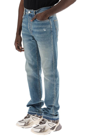 AMIRI Medium-Washed Distressed Jeans for Men