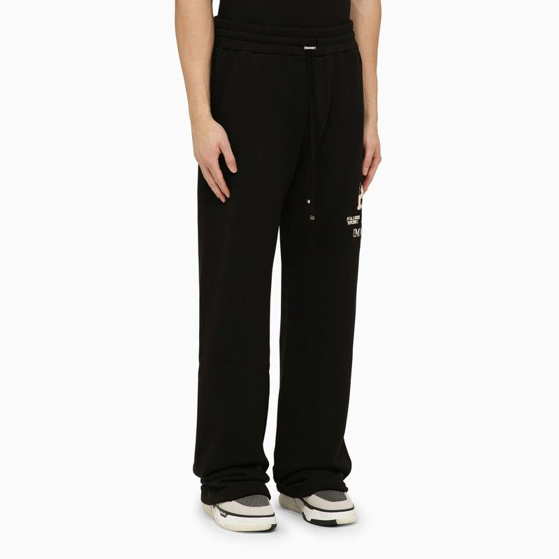 AMIRI Black Cotton Jogging Trousers for Men with Side Logo Print and Leather Label