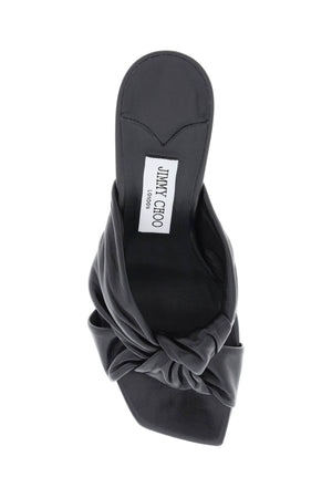 JIMMY CHOO Luxurious Black Woven Flat Sandals for Women