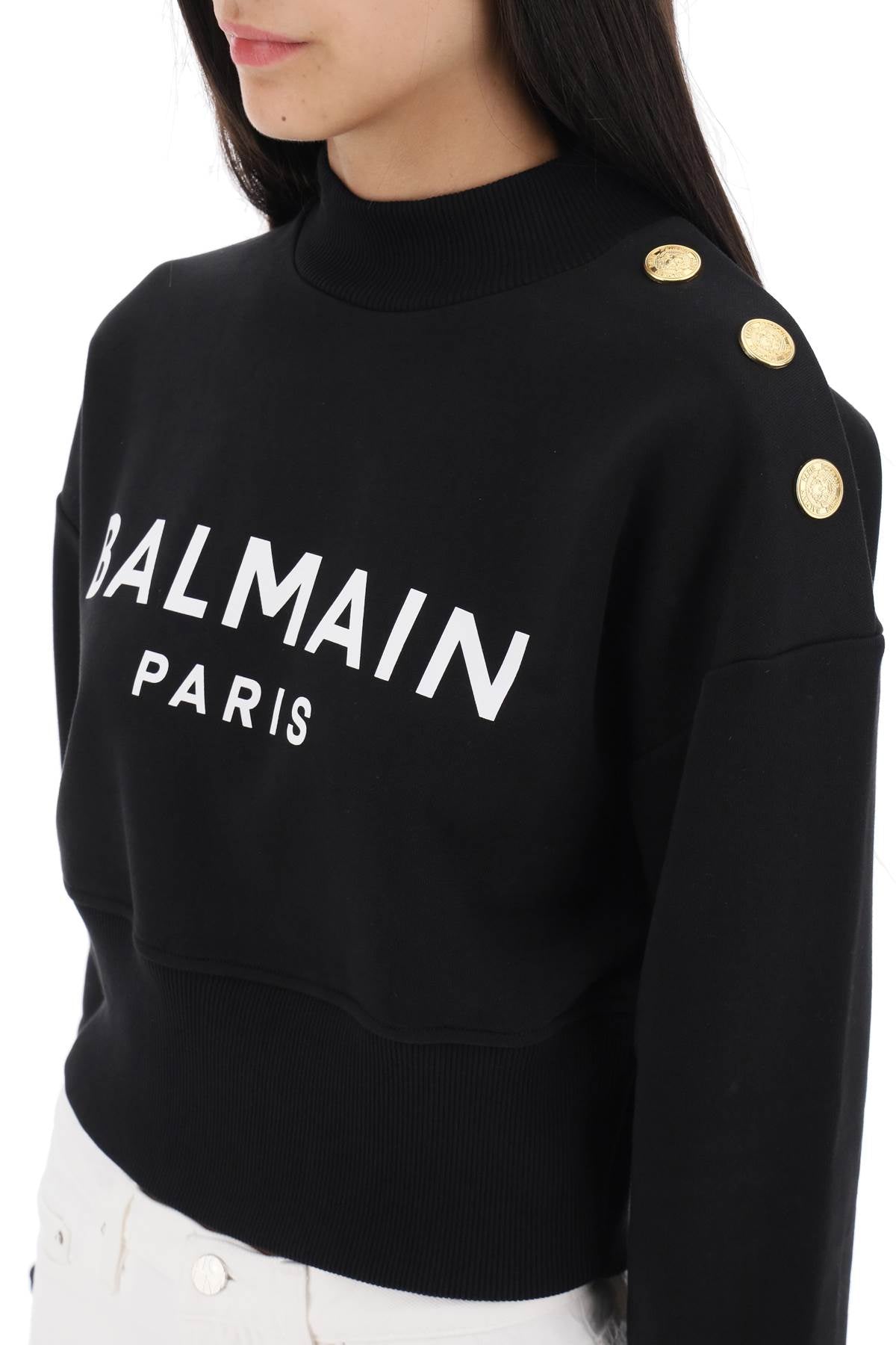 Áo len hoodie đen cổ điển với nút cài của Balmain cho phụ nữ