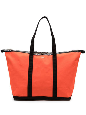 Túi xách JW Anderson x APC với họa tiết logo màu cam dành cho nam