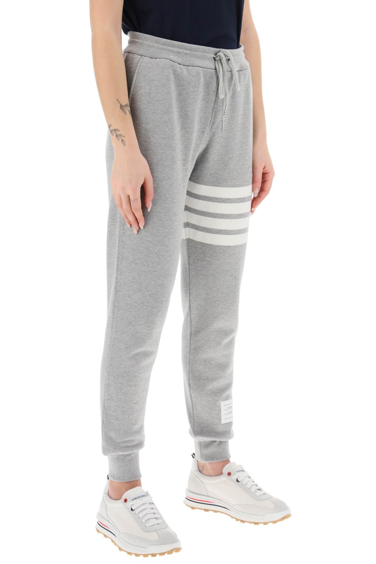 Quần sweatpants 4-sọc xám nữ FW23