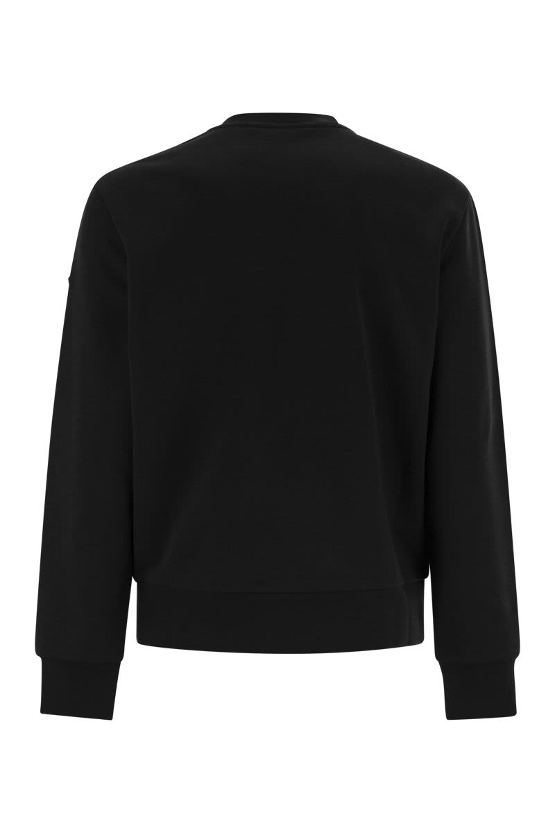 MONCLER Contemporary Crew-Neck Sweatshirt with Whimsical Logo