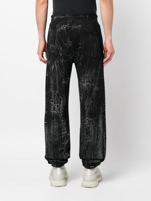 AMIRI Cracked Dye Logo Sweatpants for Men - SS23 Collection