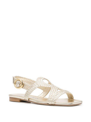 STUART WEITZMAN Wovette Flat Sandal in Light Gold for Women