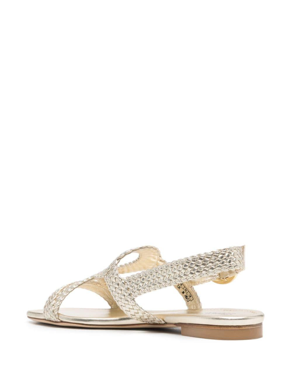 STUART WEITZMAN Wovette Flat Sandal in Light Gold for Women