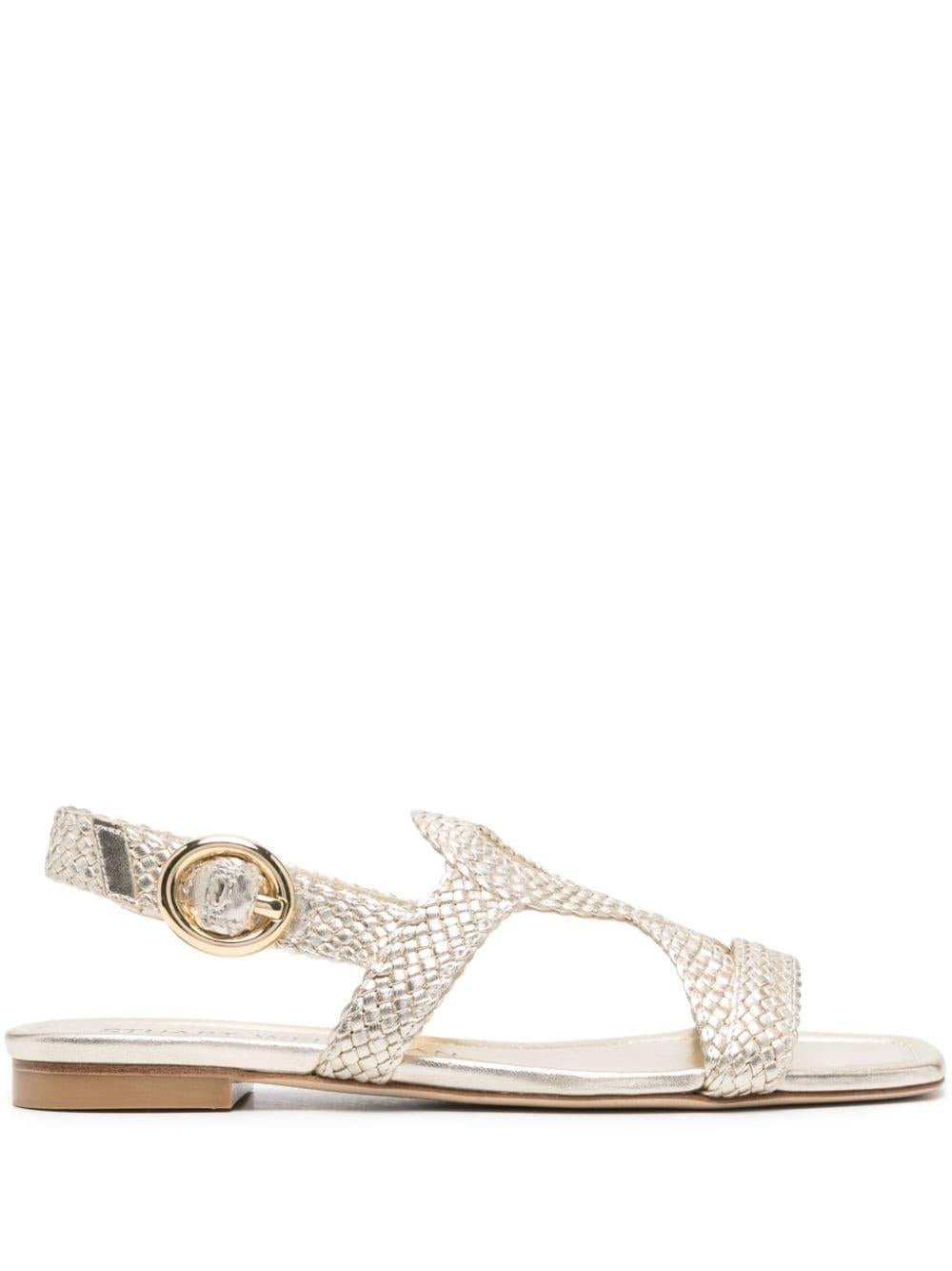 STUART WEITZMAN Wovette Flat Sandal in Light Gold for Women