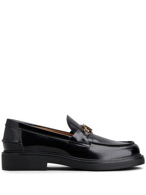 TOD'S Sophisticated Logo Plaque Loafers for Women