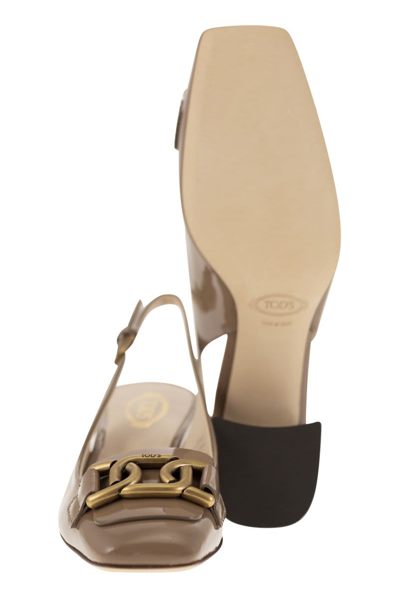 TOD'S Stylish Slingback Pumps with Custom Metal Chain Accessory